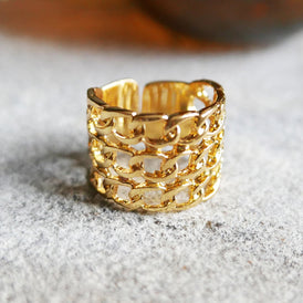 Złoty pierścionek z łańcuchami